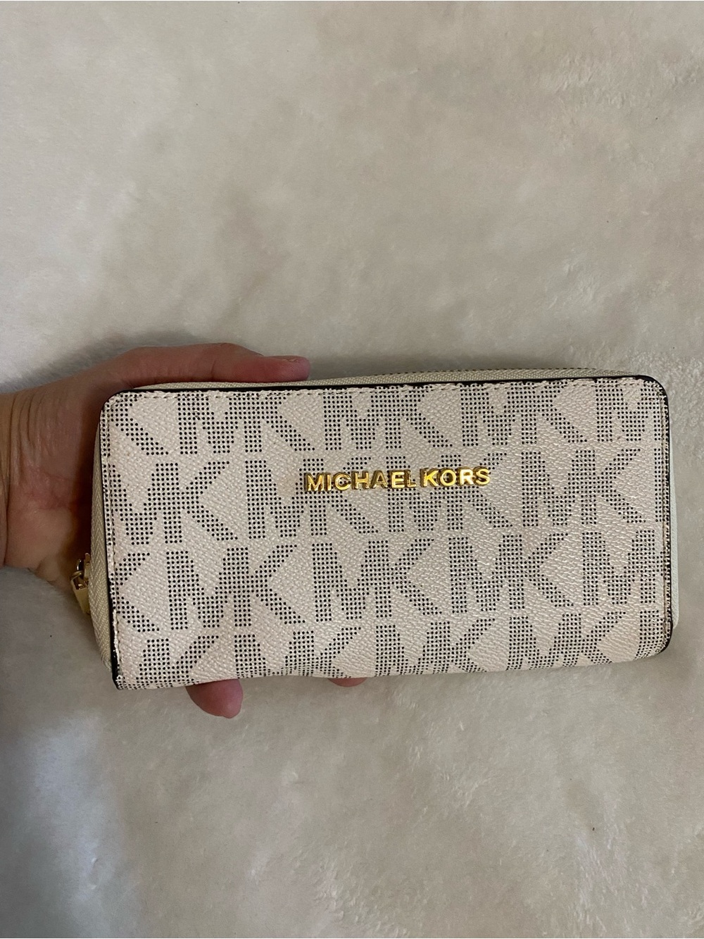 Michael Kors Jet Set Travel Continental Wallet in the vanilla signature monogram